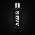 A 250ml black bottle of AABIS Essentials Shampoo with a reflective silver cap, set against a solid black background.